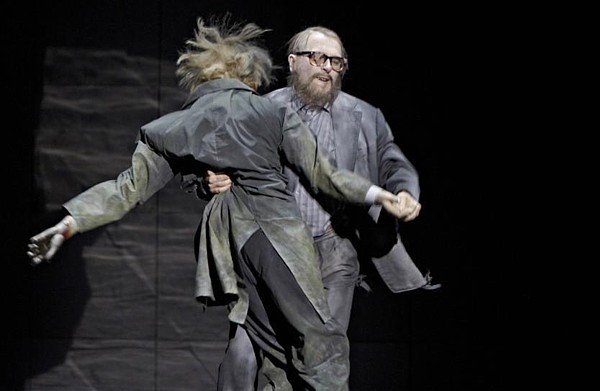 The Shabby Peasant (Christopher Busietta) dances with the corpse of Zinoviy. Photo: A T Schaefer